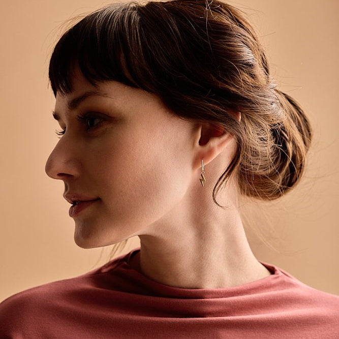 Blomdahl titanium oorringen goudkleurig met bliksem – 14 mm