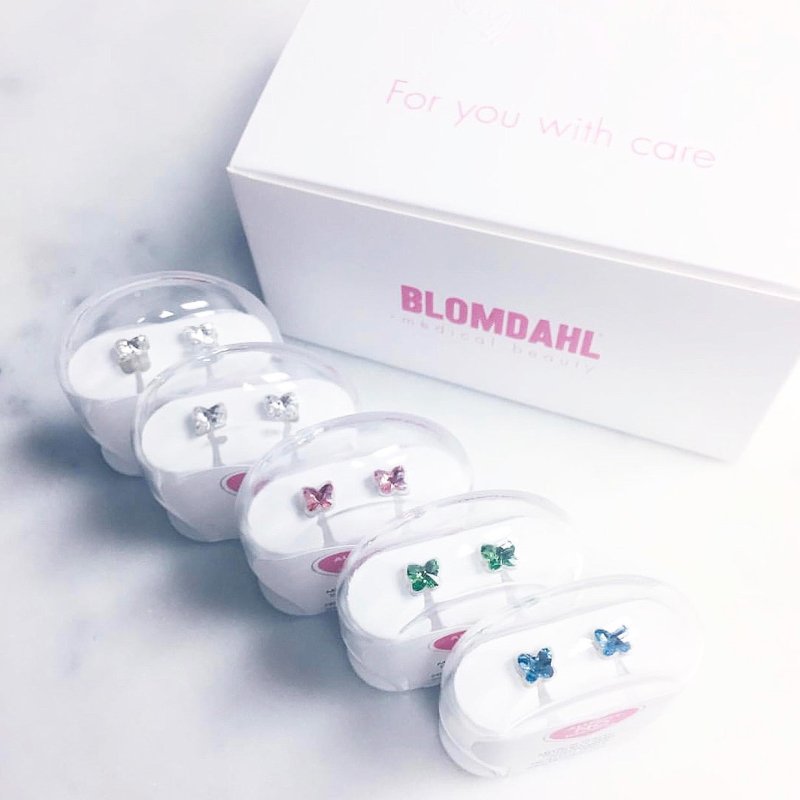 Oorbellen Blomdahl huidvriendelijk vlindertje aqua blauw (incl. achterkantjes) - Staartjes en Strikjes