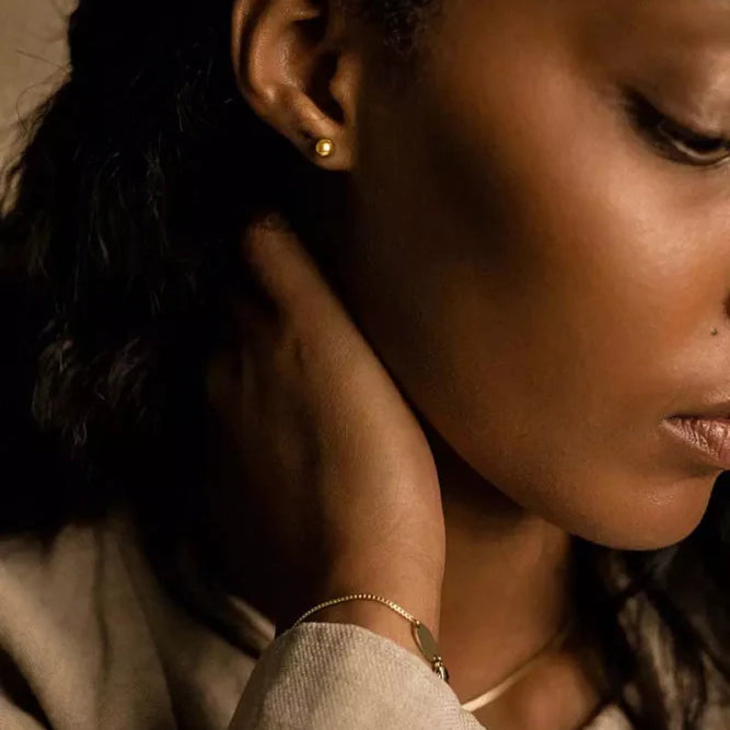 Oorbellen Blomdahl titanium bolletje goudkleurig 5 mm. (incl. achterkantjes) - Staartjes en Strikjes