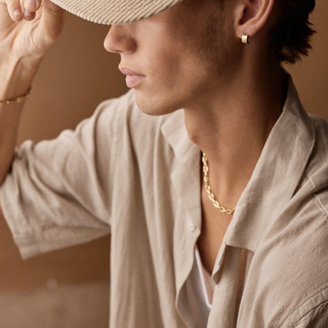 Oorbellen Blomdahl titanium boog goudkleurig 10 mm. (incl. achterkantjes)