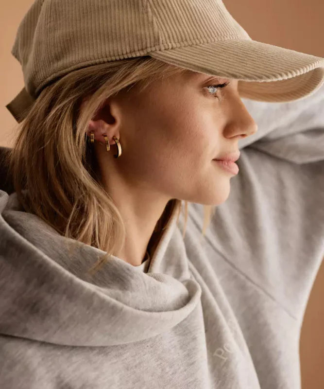 Oorbellen Blomdahl titanium boogje goudkleurig 15 mm. (incl. achterkantjes) - Staartjes en Strikjes