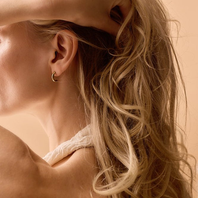 Oorbellen Blomdahl titanium boogje goudkleurig 15 mm (incl. achterkantjes)