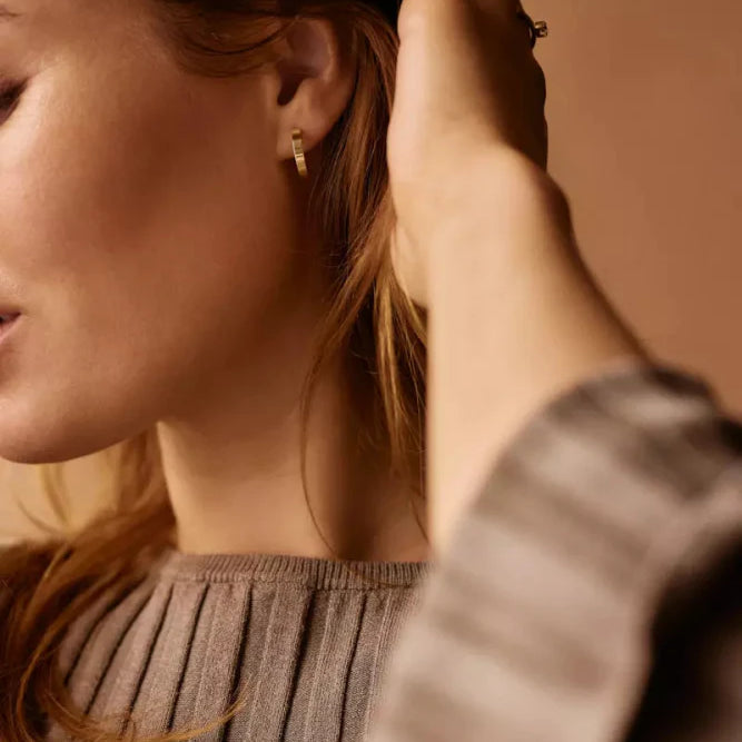 Oorbellen Blomdahl titanium boogje goudkleurig 15 mm. (incl. achterkantjes) - Staartjes en Strikjes