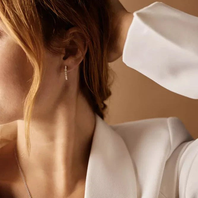 Oorbellen Blomdahl titanium boogje goudkleurig met crystal pearls 15 mm. (incl. achterkantjes)