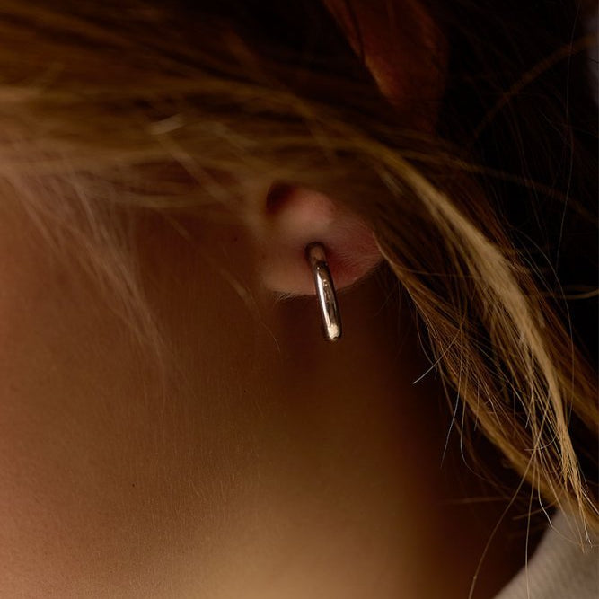 Oorbellen Blomdahl titanium boogje zilverkleurig 15 mm (incl. achterkantjes)