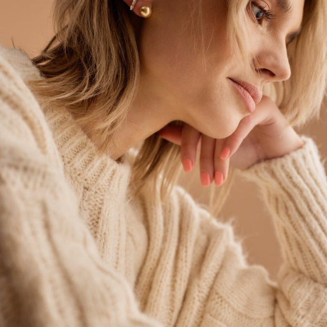 Oorbellen Blomdahl titanium golden shimmer parel 10 mm.