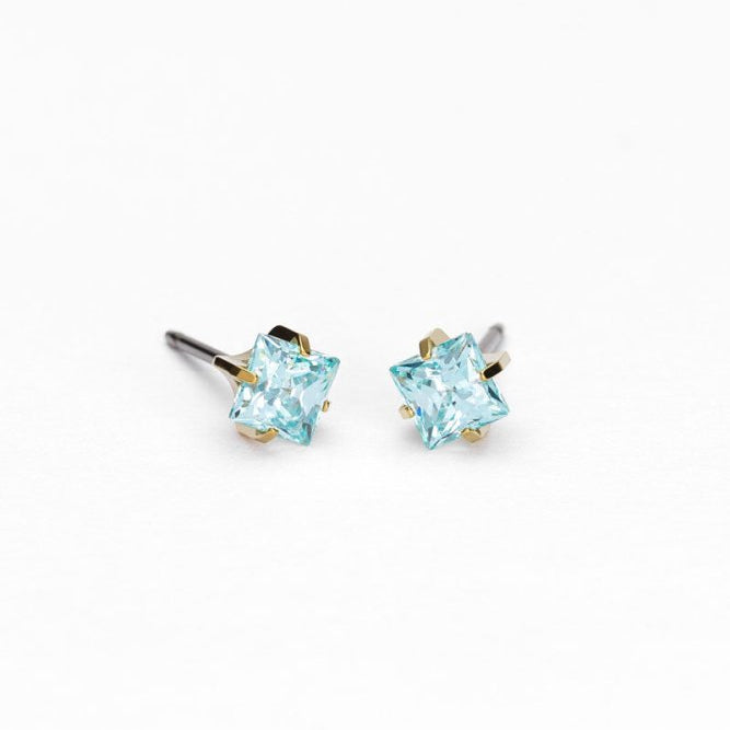 Oorbellen Blomdahl titanium goudkleurig knopje 5 mm. aqua zirconiasteentje - Staartjes en Strikjes