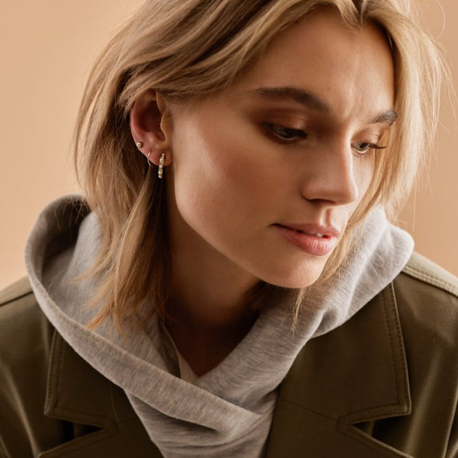 Oorbellen Blomdahl titanium goudkleurige oorringen 12 mm. - Staartjes en Strikjes