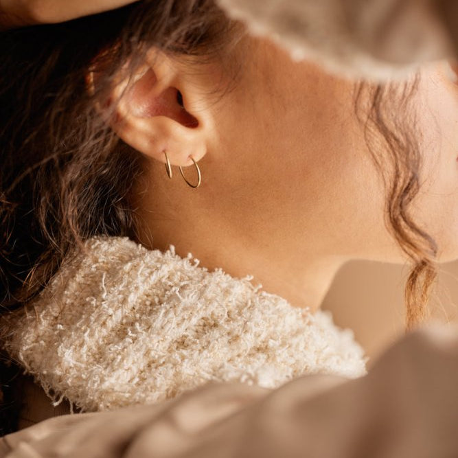 Oorbellen Blomdahl titanium goudkleurige oorringen 12 mm. - Staartjes en Strikjes