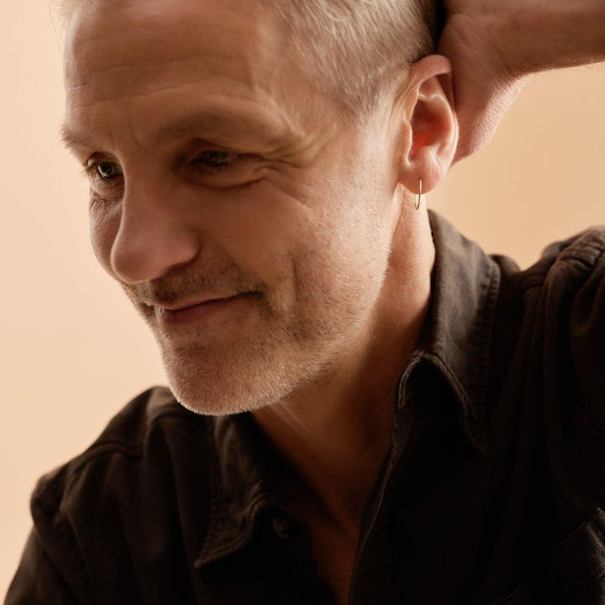 Oorbellen Blomdahl titanium goudkleurige oorringen 14 mm. - Staartjes en Strikjes