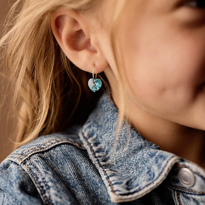 Oorbellen Blomdahl titanium goudkleurige oorringen – 14 mm kristallen hartje aqua marine - Staartjes en Strikjes