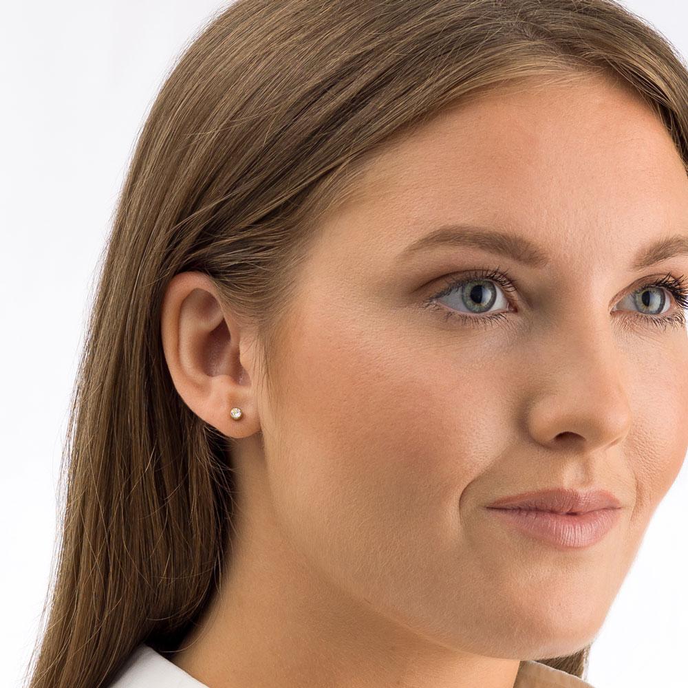 Oorbellen Blomdahl titanium knopje 4 mm. crystal goudkleurig (incl. achterkantjes) *