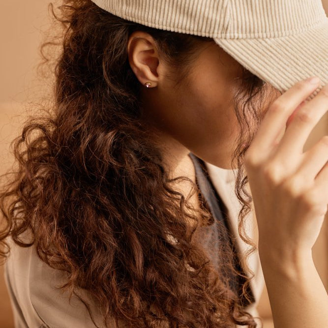 Oorbellen Blomdahl titanium knopje 5 mm. goudkleurig roze crystal (incl. achterkantjes)