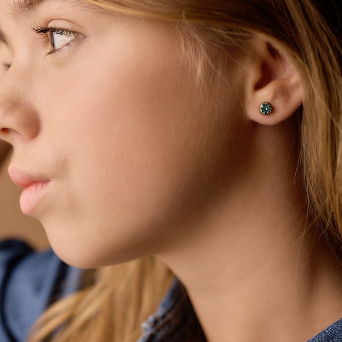 Oorbellen Blomdahl titanium knopje 6 mm. crystal turqoise (incl. achterkantjes)