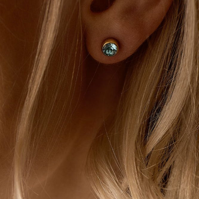 Oorbellen Blomdahl titanium knopje 6 mm. crystal turqoise (incl. achterkantjes)