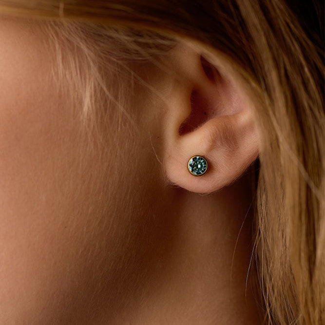 Oorbellen Blomdahl titanium knopje 6 mm. crystal turqoise (incl. achterkantjes) - Staartjes en Strikjes