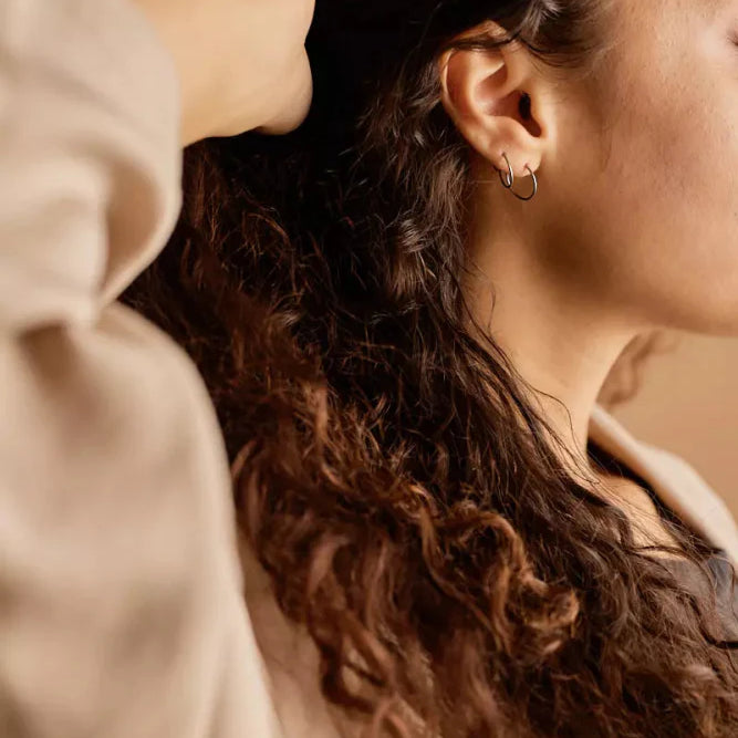 Oorbellen Blomdahl titanium oorringen 12 mm. - Staartjes en Strikjes