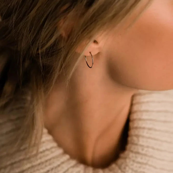 Oorbellen Blomdahl titanium oorringen 14 mm. - Staartjes en Strikjes