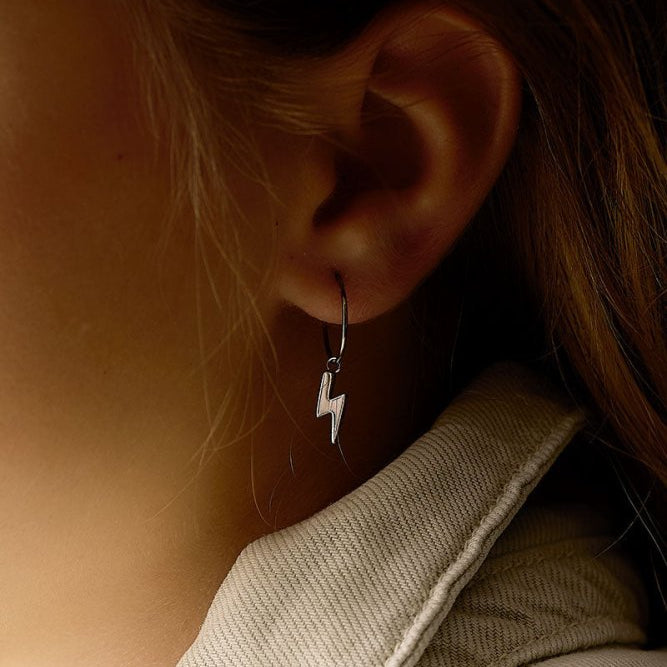 Oorbellen Blomdahl titanium oorringen 14 mm. bliksem