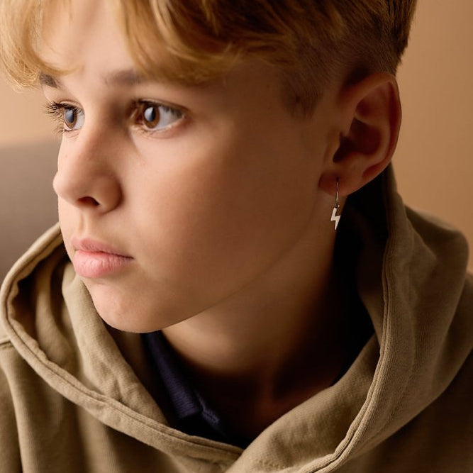 Oorbellen Blomdahl titanium oorringen 14 mm. bliksem