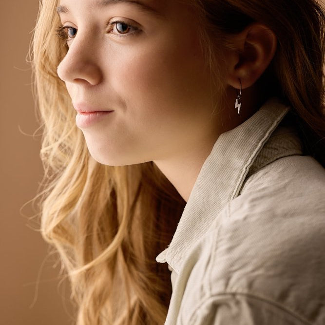 Oorbellen Blomdahl titanium oorringen 14 mm. bliksem