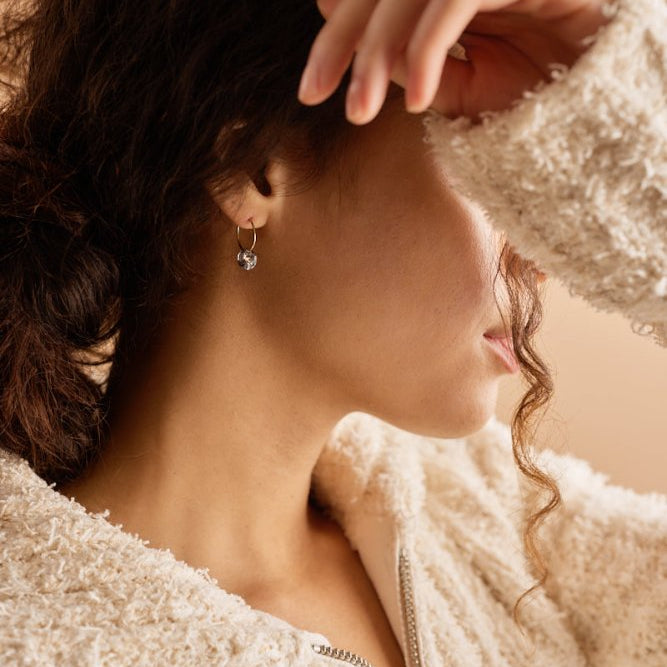 Oorbellen Blomdahl titanium oorringen goudkleurig 14 mm. kristal black diamond - Staartjes en Strikjes