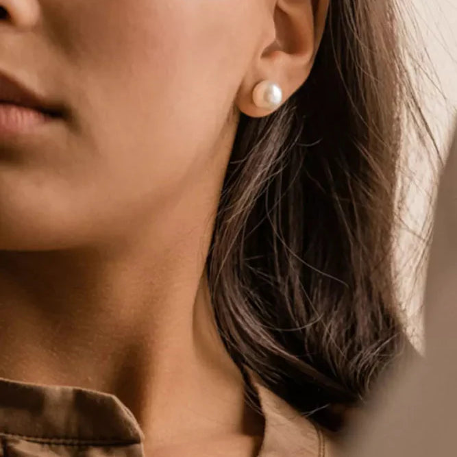 Oorbellen Blomdahl titanium parel 10 mm. (incl. achterkantjes) - Staartjes en Strikjes