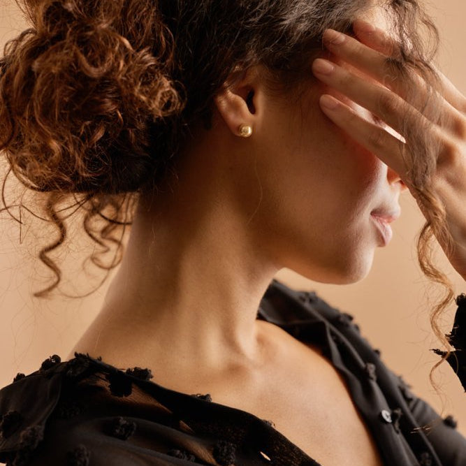 Oorbellen Blomdahl titanium parel 8 mm. golden shimmer