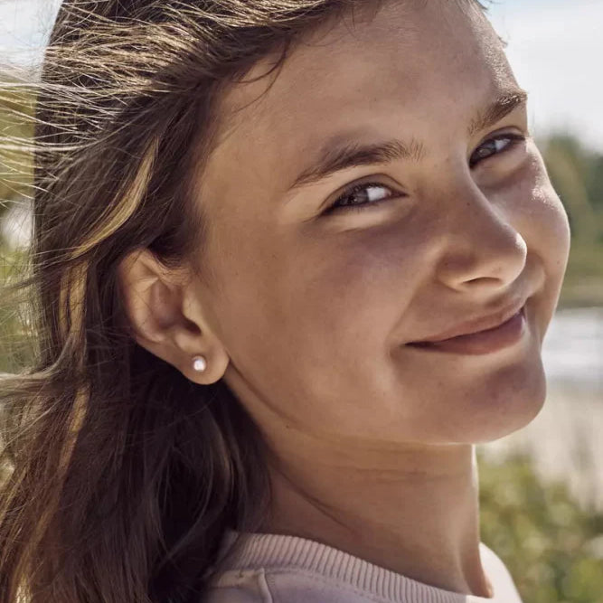 Oorbellen Blomdahl titanium parel licht roze 6 mm. (incl. achterkantjes) - Staartjes en Strikjes