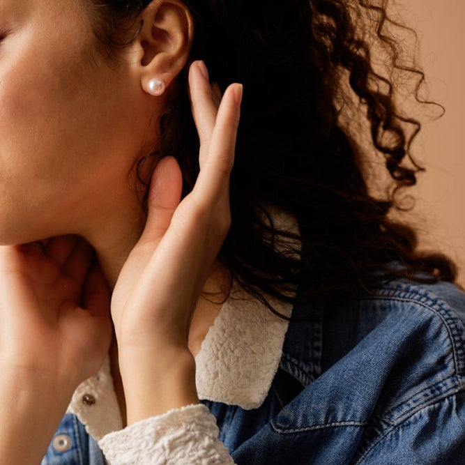 Oorbellen Blomdahl titanium roze parel 10 mm.