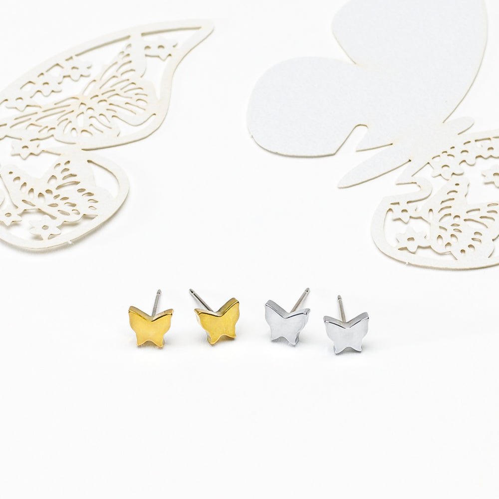 Oorbellen Blomdahl titanium vlindertje goudkleurig 8 mm. (incl. achterkantjes) - Staartjes en Strikjes