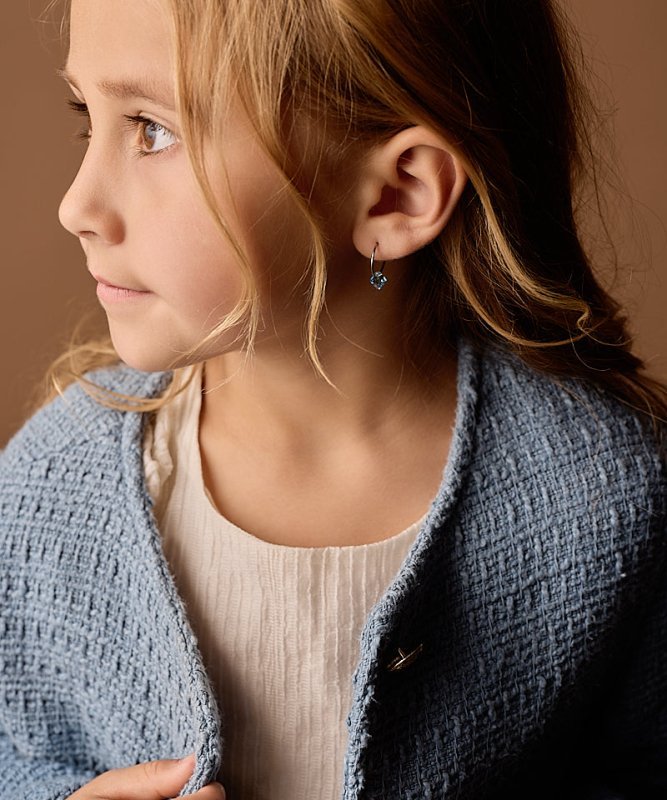 Blomdahl titanium oorringen met aquamarine crystal – 14 mm