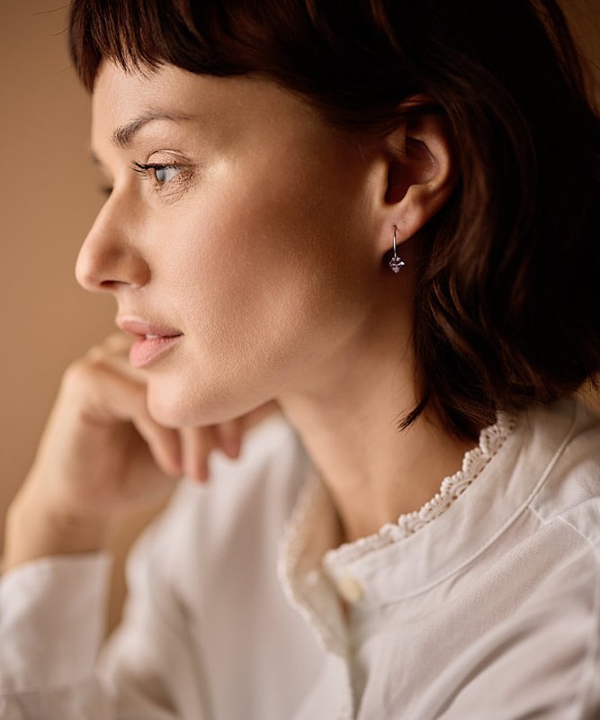 Blomdahl titanium oorringen met lichtpaars crystal – 14 mm