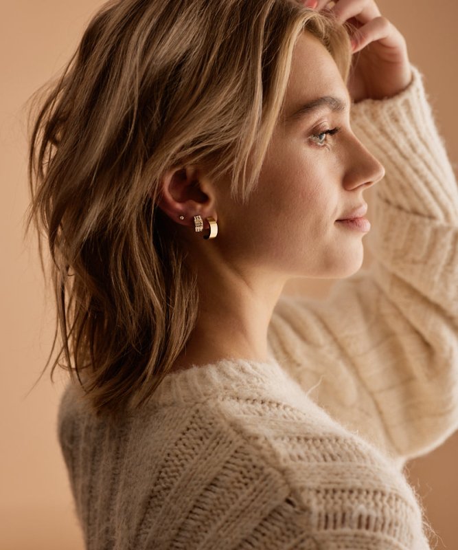 Oorbellen Blomdahl titanium boog goudkleurig - 15 mm - Staartjes en Strikjes