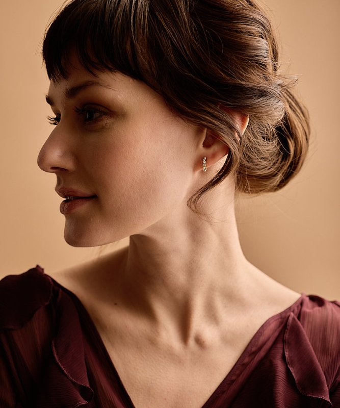 Oorbellen Blomdahl titanium boogje goudkleurig met pareltjes en kristallen – 10 mm