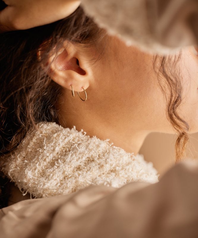 Oorbellen Blomdahl titanium goudkleurige oorringen 14 mm.