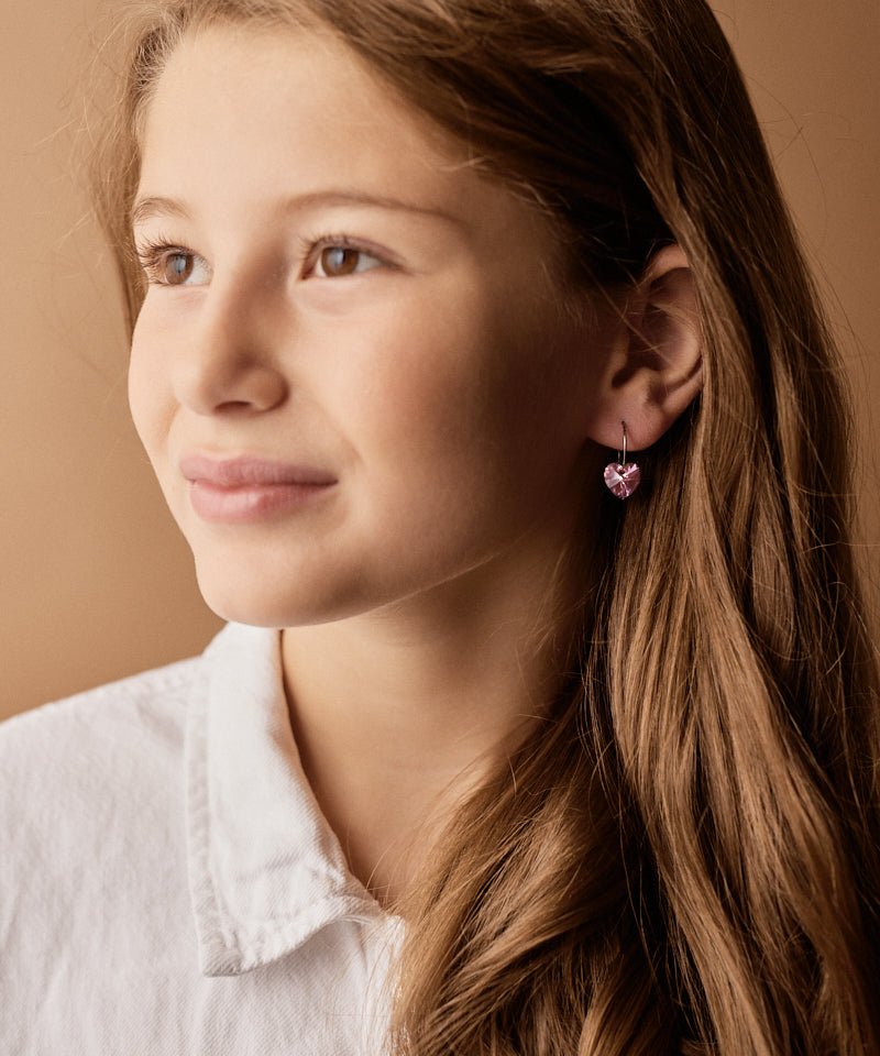 Oorbellen Blomdahl titanium oorringen 14 mm. hartje roze