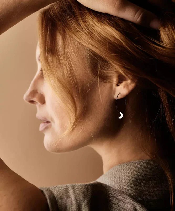 Oorbellen Blomdahl titanium oorringen 25 mm. met maan