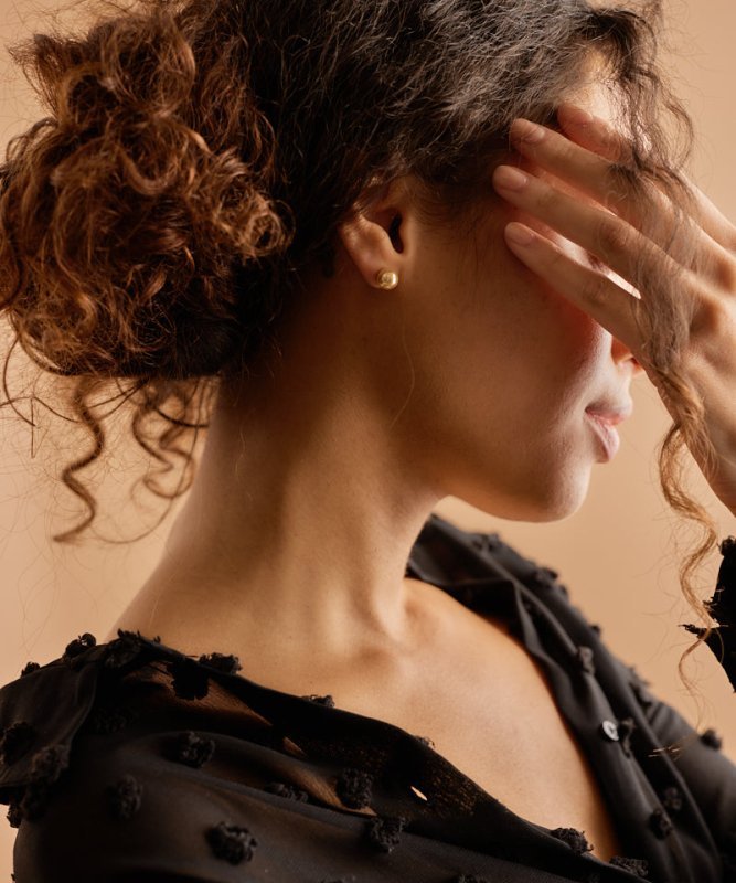 Oorbellen Blomdahl titanium parel 8 mm. golden shimmer