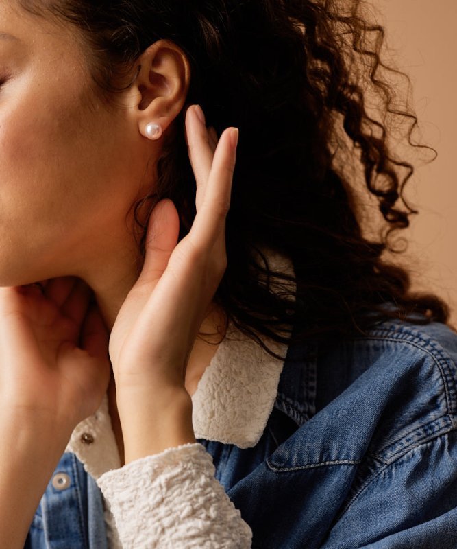 Oorbellen Blomdahl titanium roze parel 10 mm.