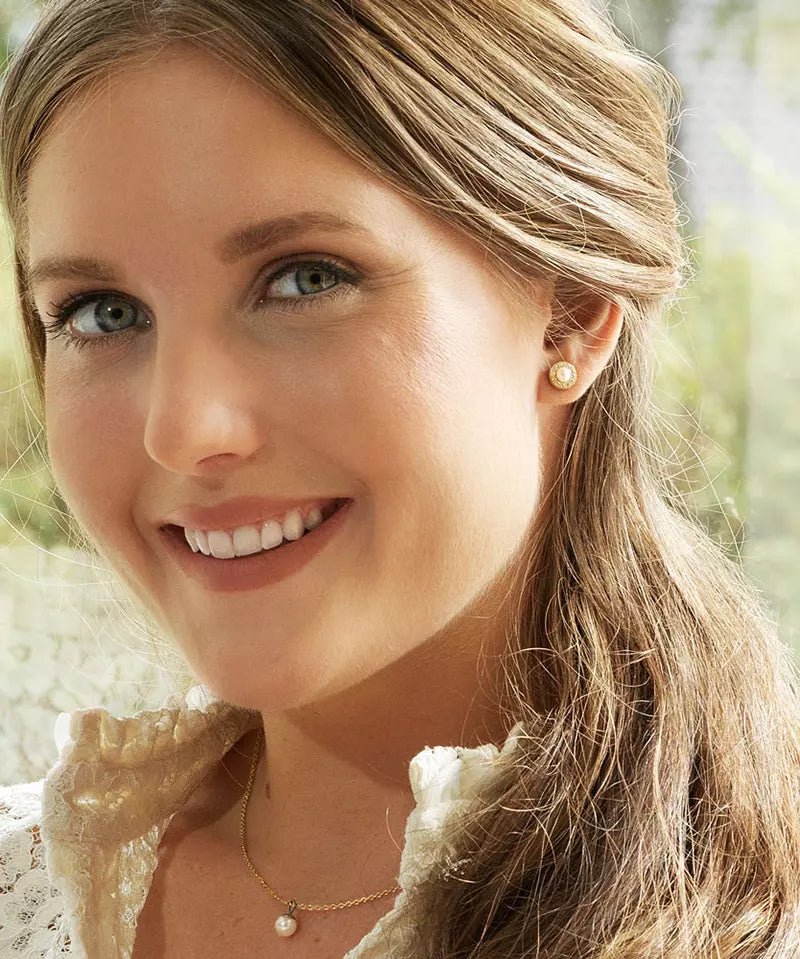 Halsketting Blomdahl chirurgisch staal goudkleurig met parelknopje 6 mm.