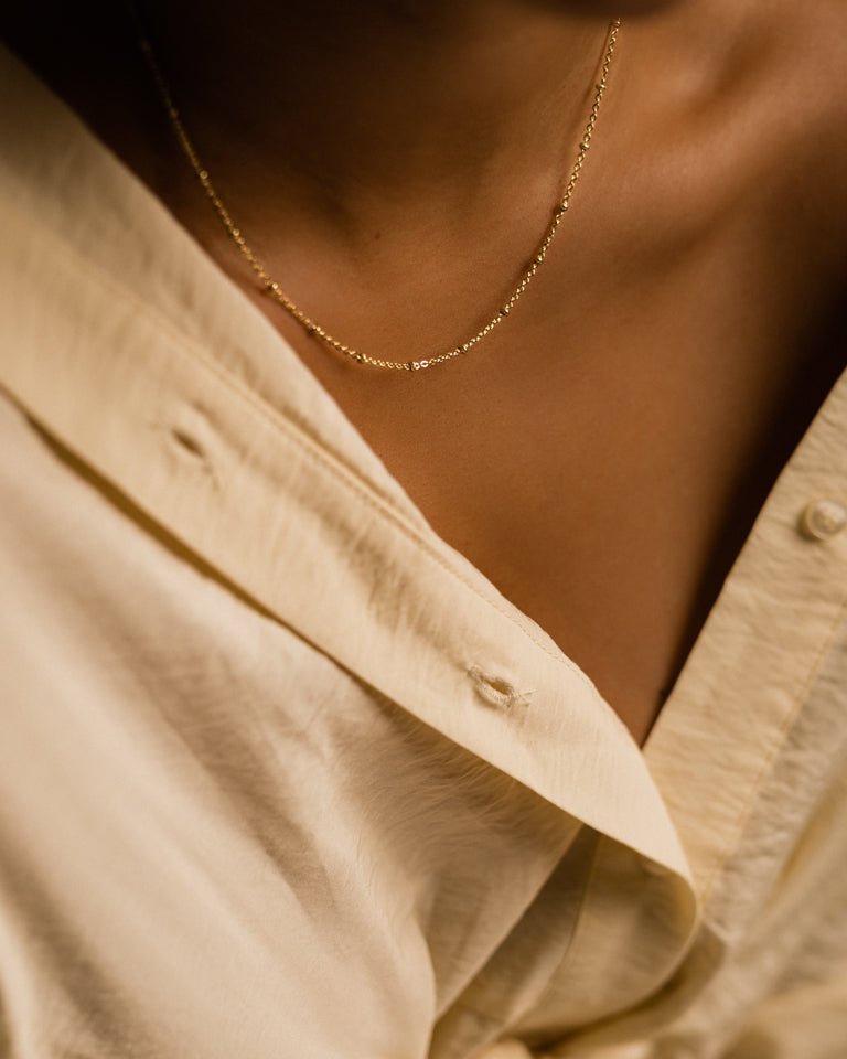 Halsketting Blomdahl chirurgisch staal met bolletjes goudkleurig